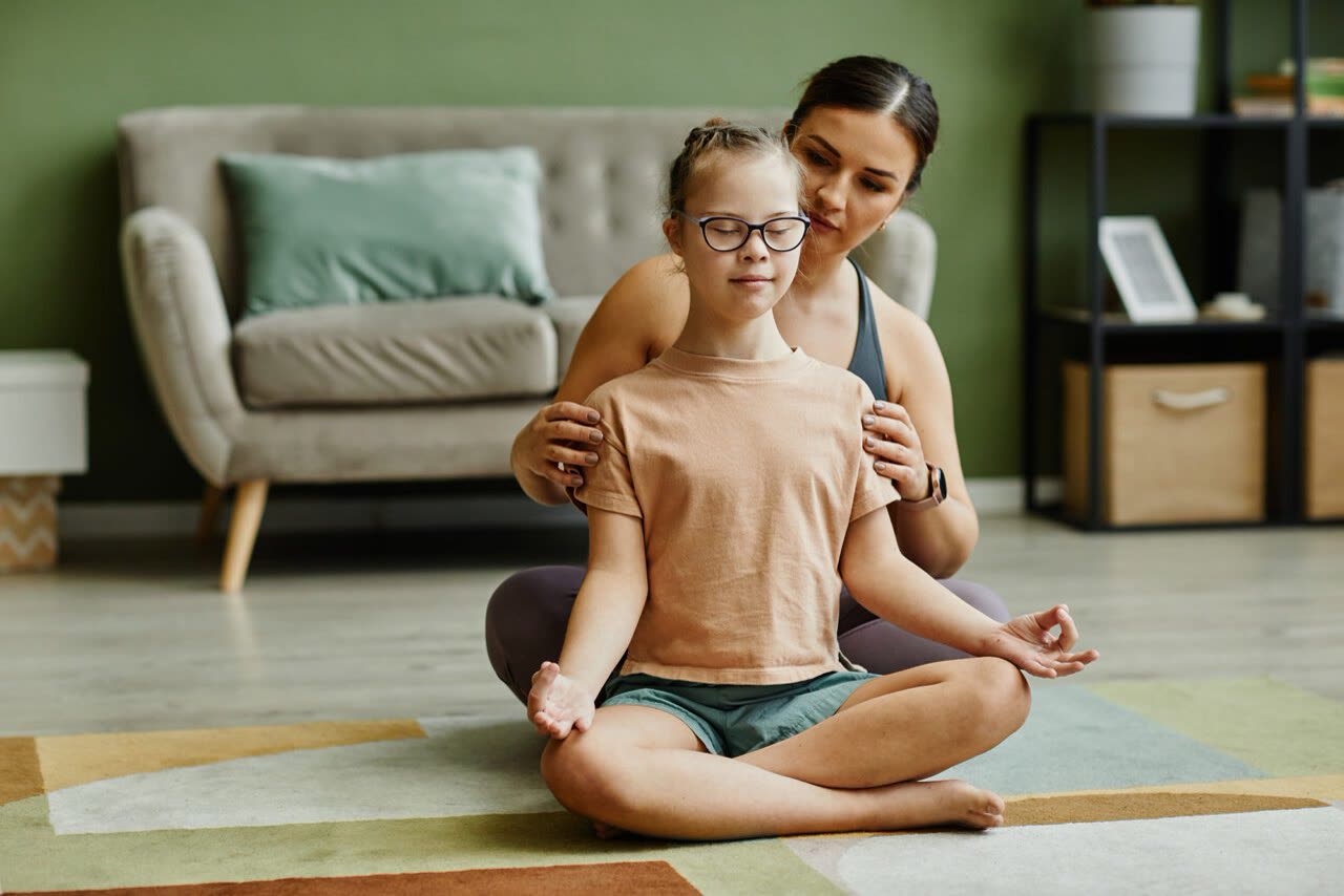A participant enjoying a gentle yoga session during a respite stay